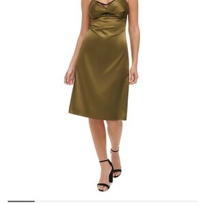 Slip into a perfect date night look with this lace-trim dress from GUESS.